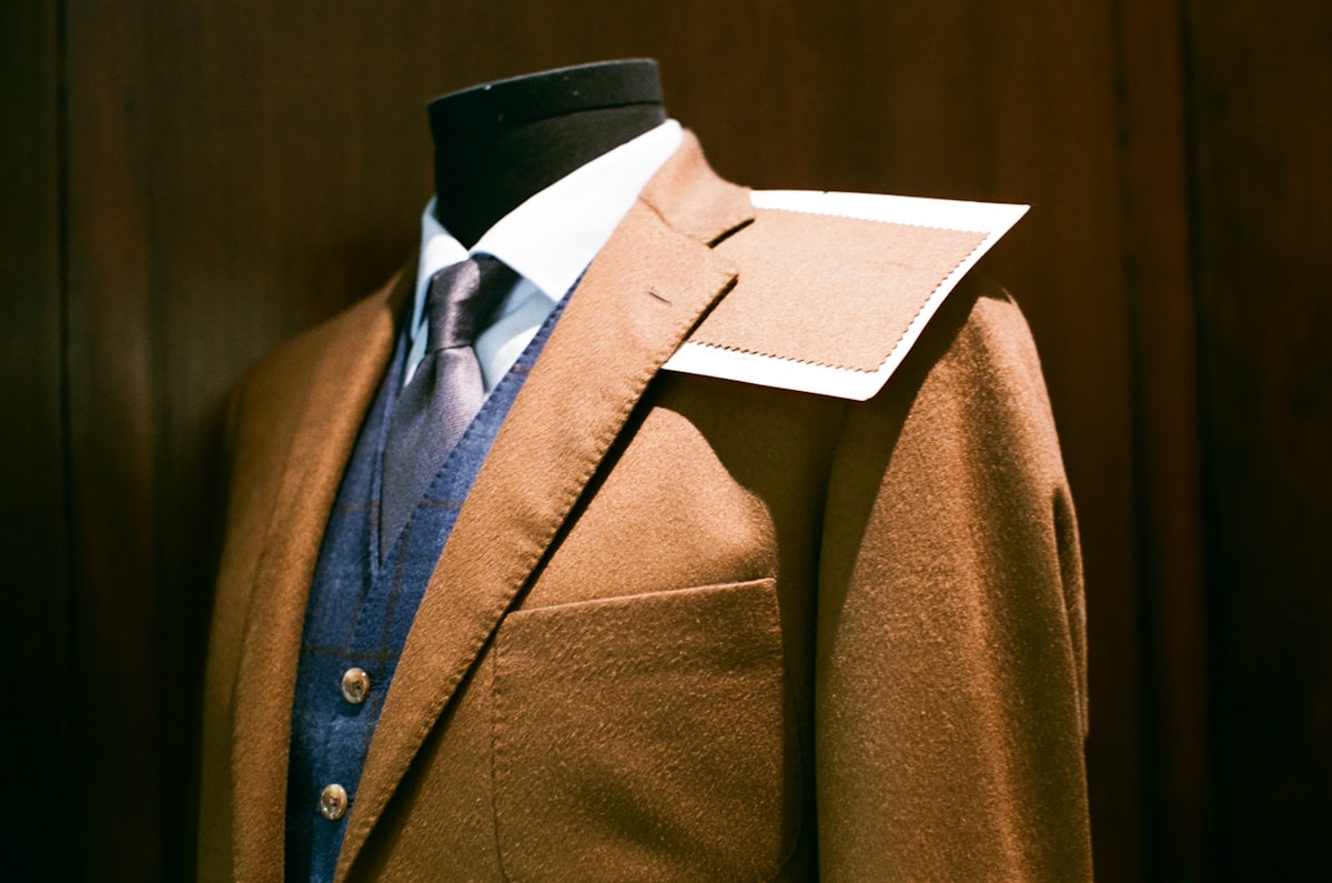 Tailored jacket and waistcoat displayed on a mannequin