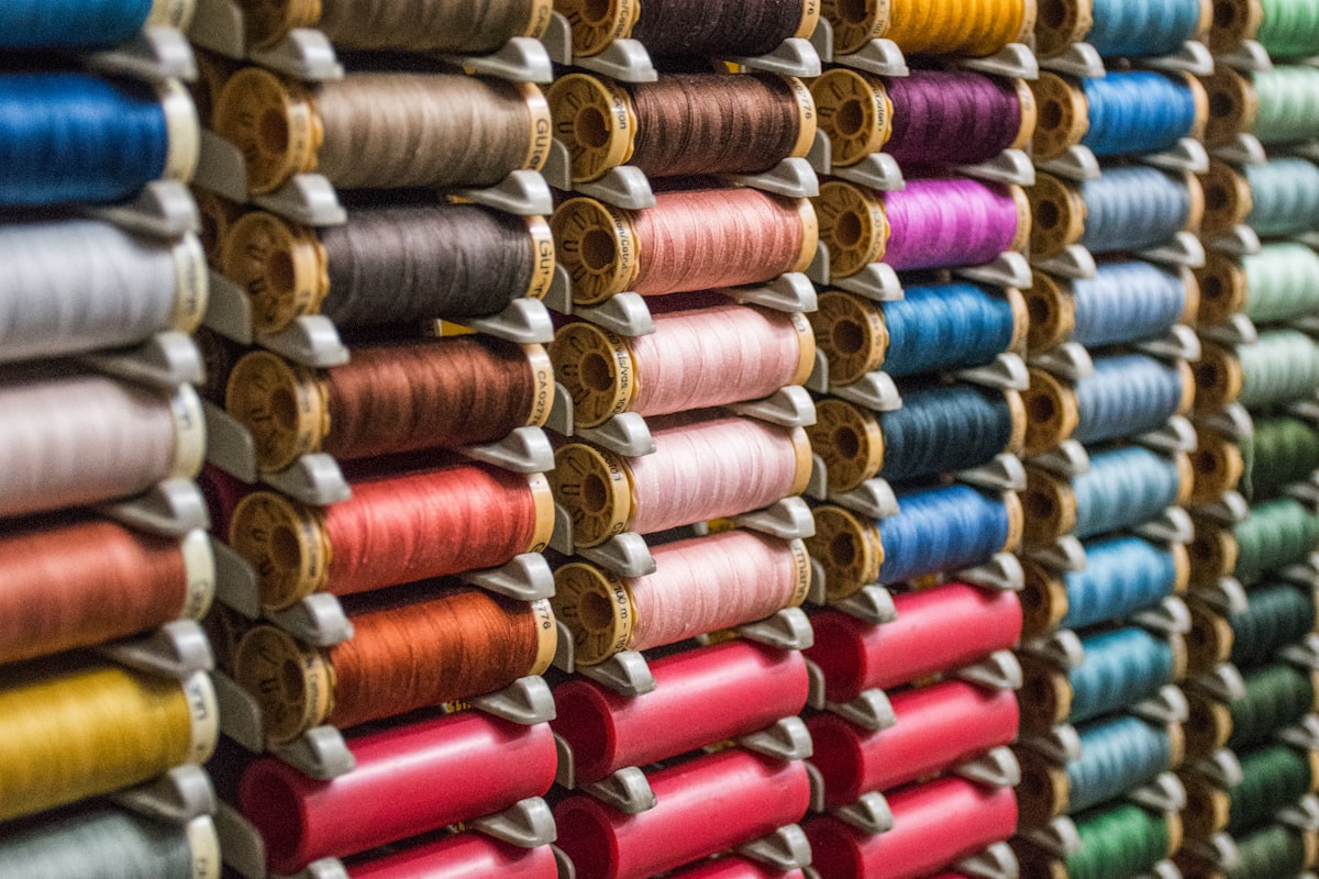 Rows of colourful thread spools